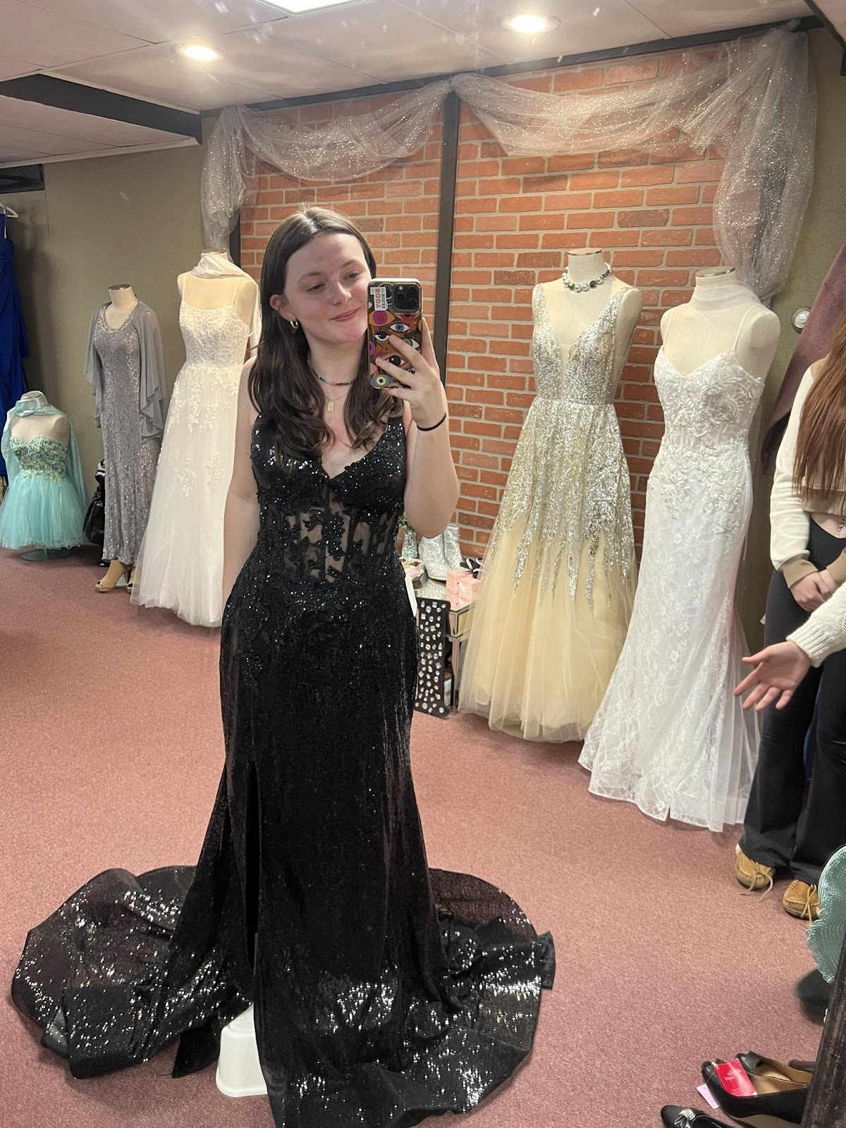 Wedding and formal gowns on display inside the boutique