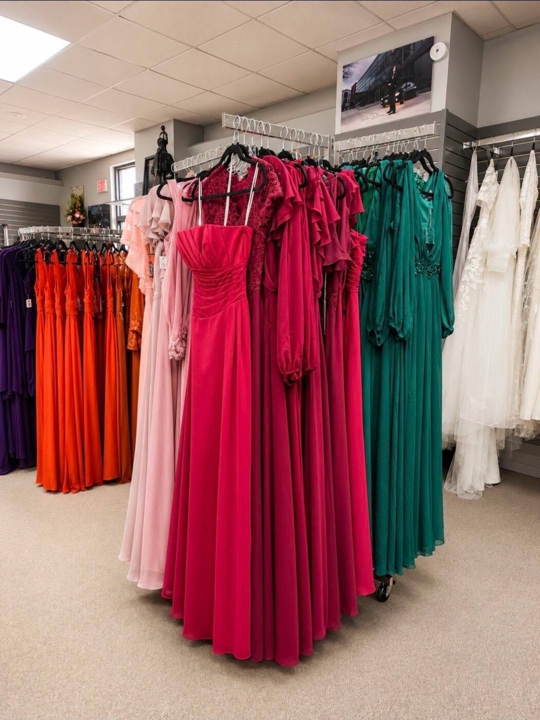 Colorful bridesmaid and formal gowns in the shop